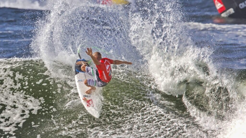 An image of Kelly Slater surfing a wave