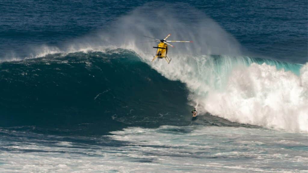 An image of a person surfing Maui’s Monster Wave in Hawaii