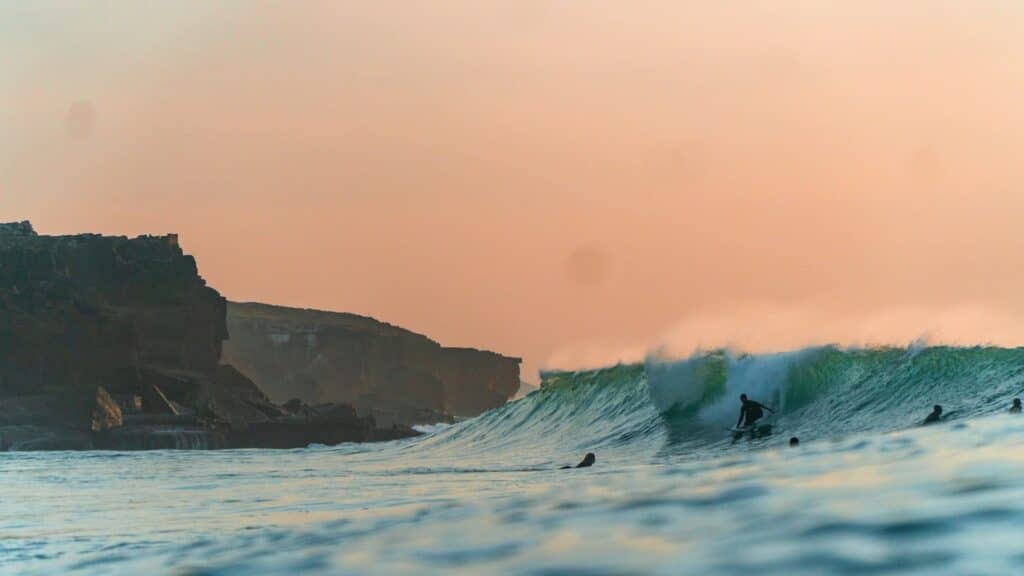 An image of a person surfing in Ericeira