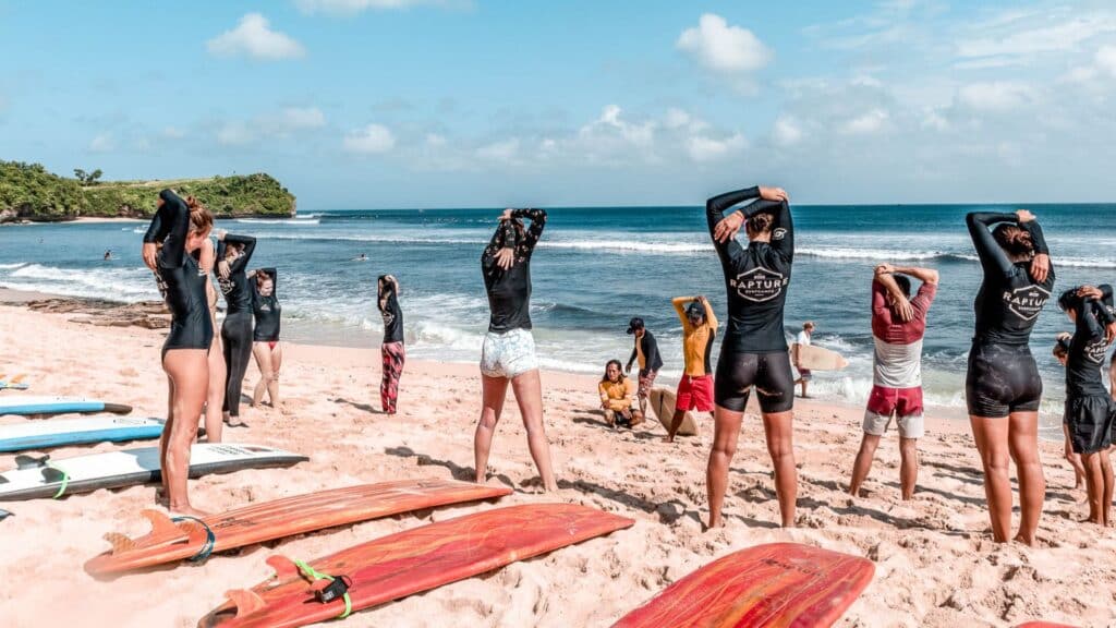 An image of rapture surfcamp guests stretching